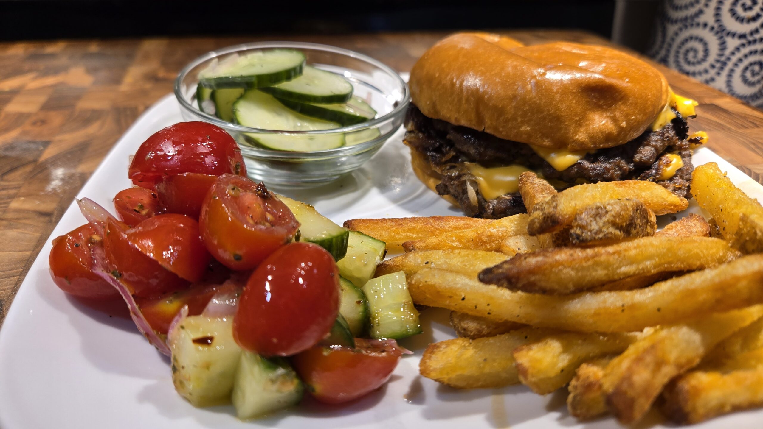 Smashed Burgers with Fries, Pickles & Tomato-Cucumber Salad