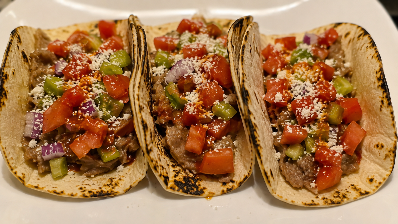 Smashed Pinto Bean Tacos with Cotija & Fresh Vegetables